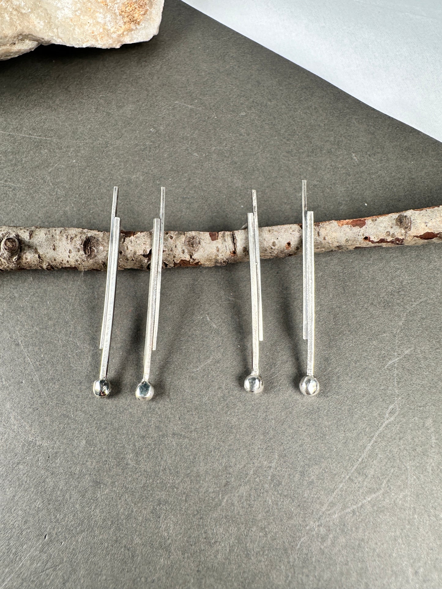 Silver pendulums
