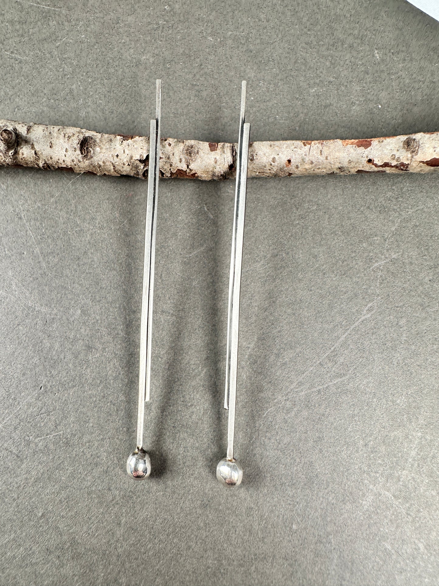 Silver pendulums