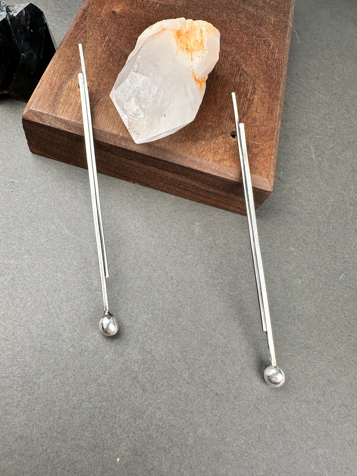 Silver pendulums