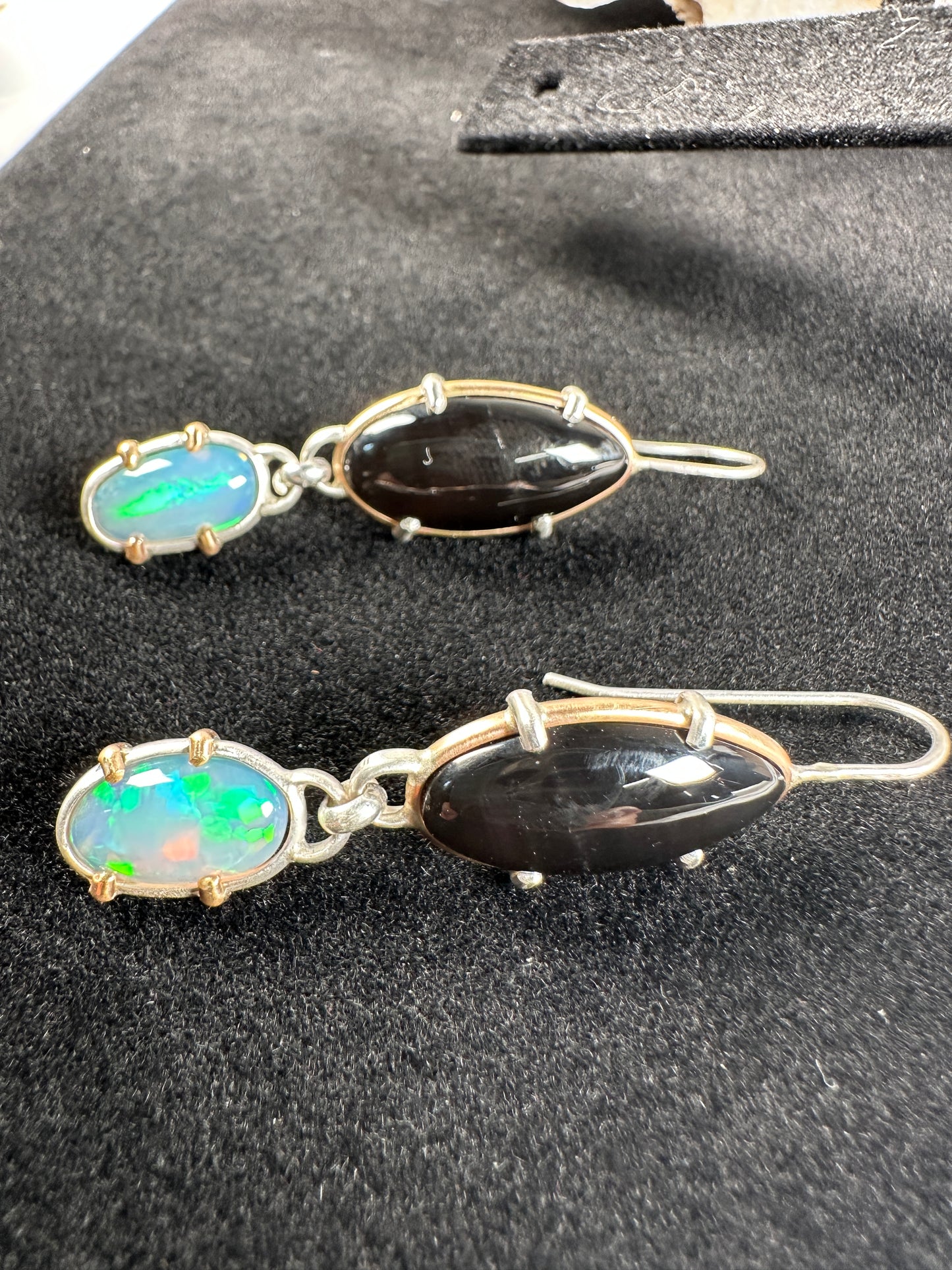 Opal and obsidian earrings