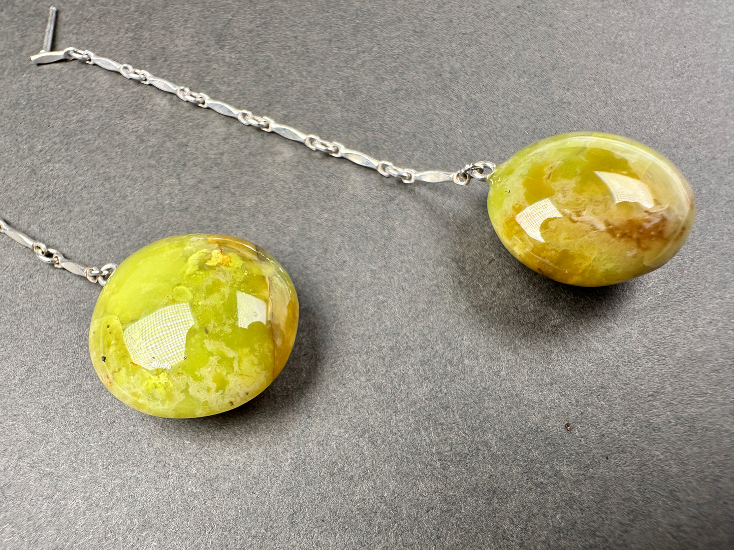 Green opal shoulder dusters