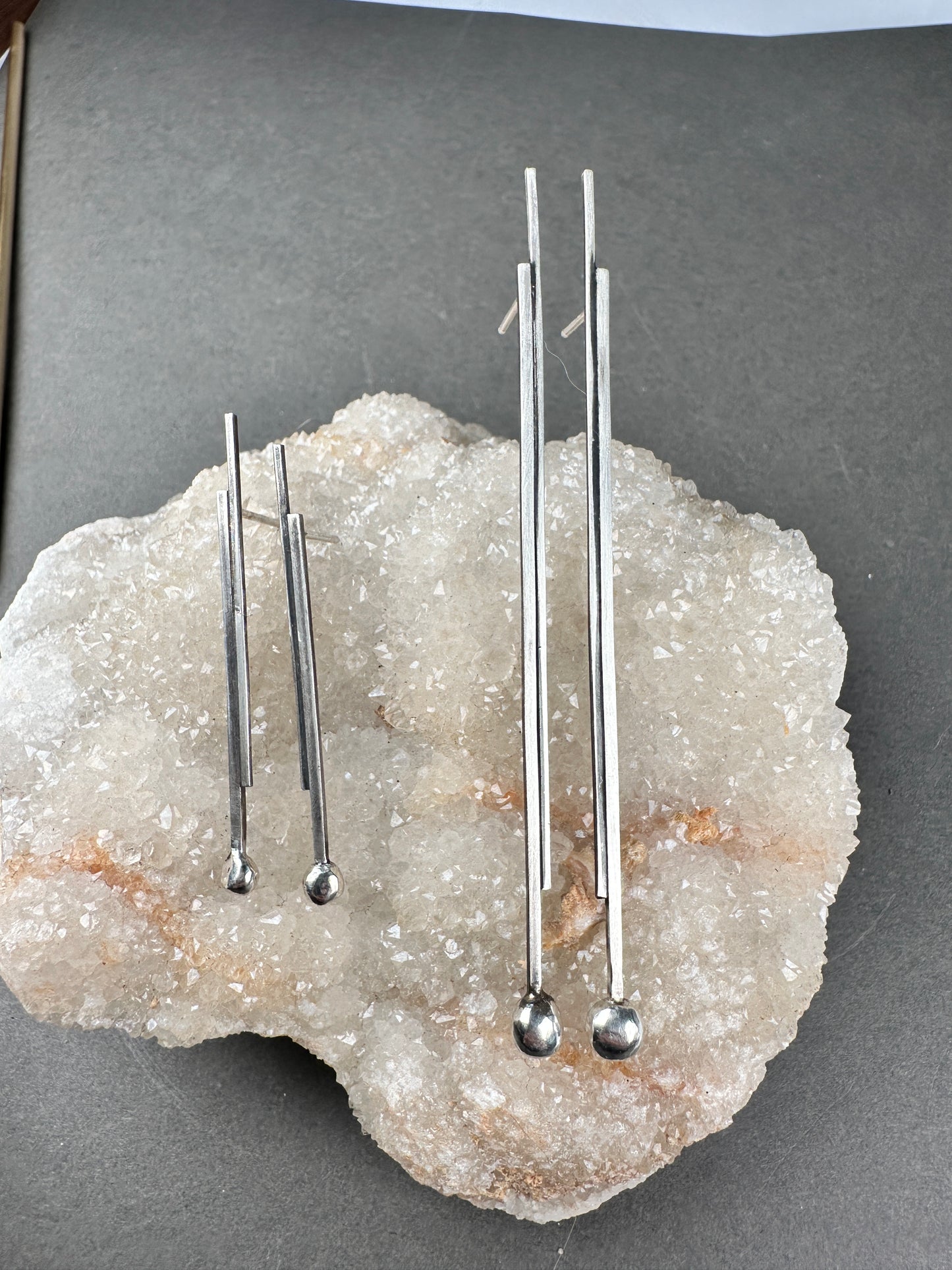 Silver pendulums