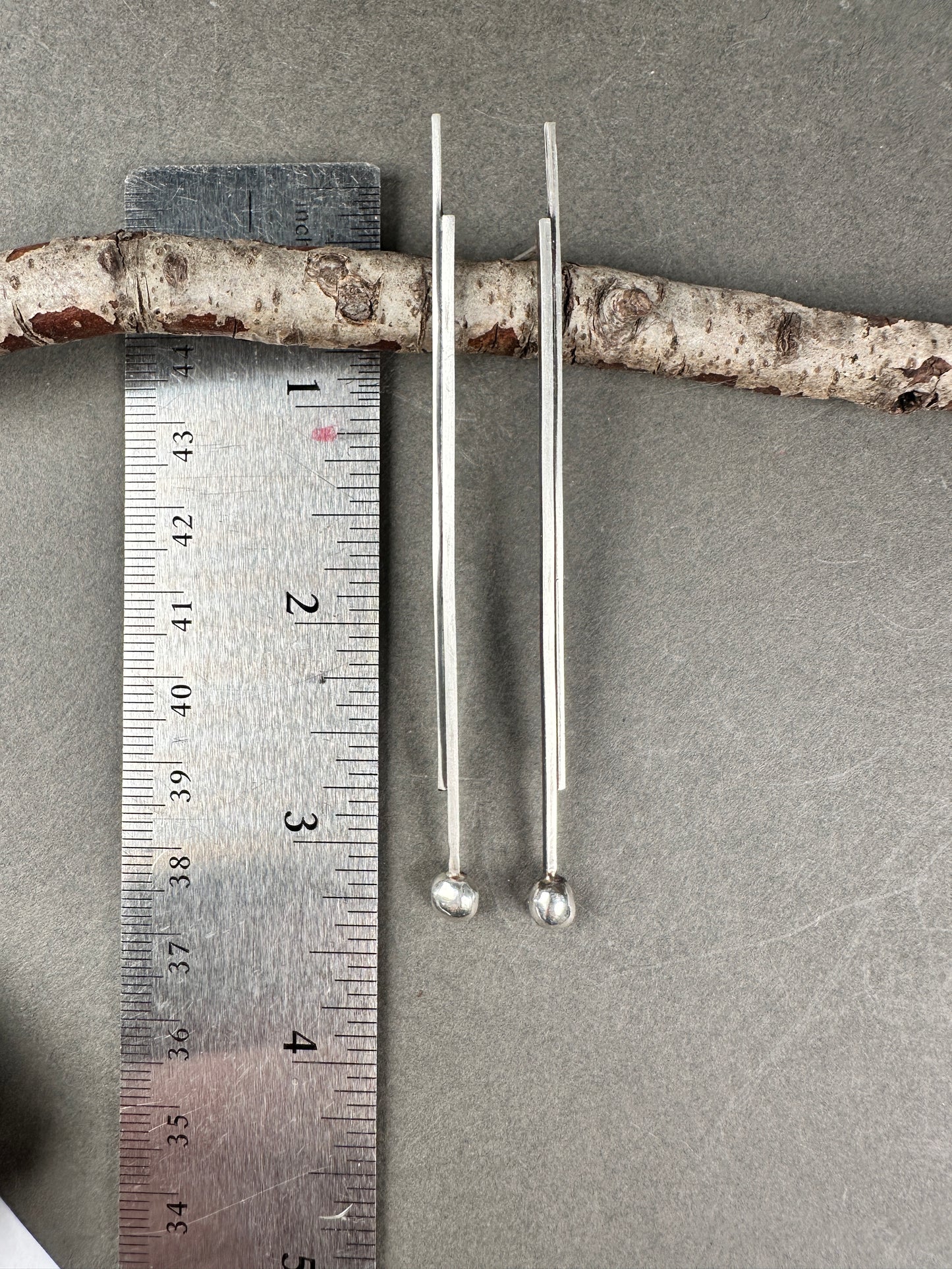 Silver pendulums